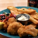 fried seafood and french fries on a plate