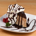 cheesecake chocolate drizzled with whip cream
